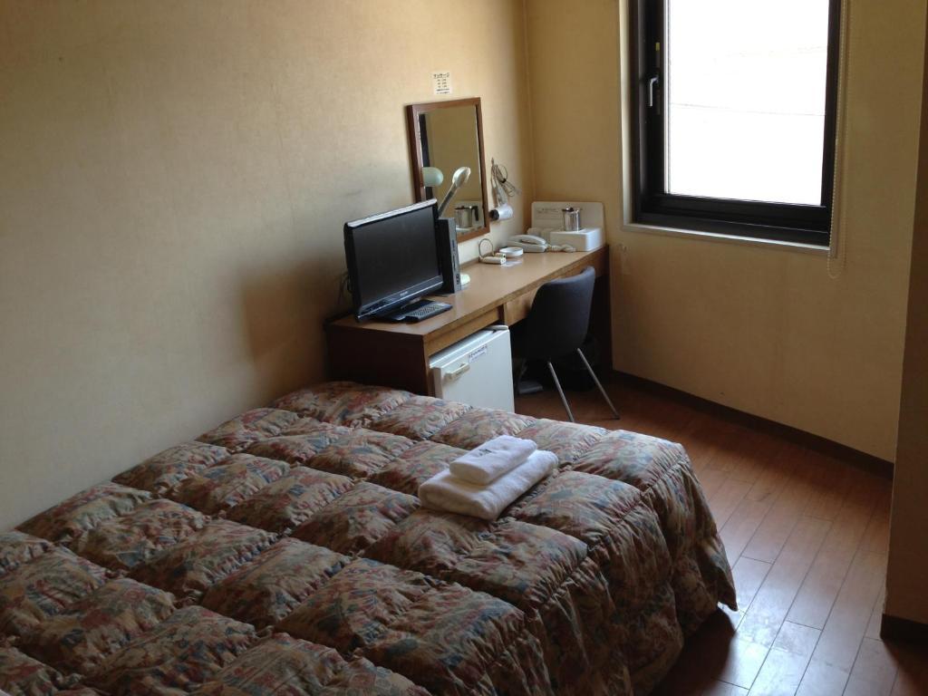 Osaka City Hotel Kyobashi Habitación foto
